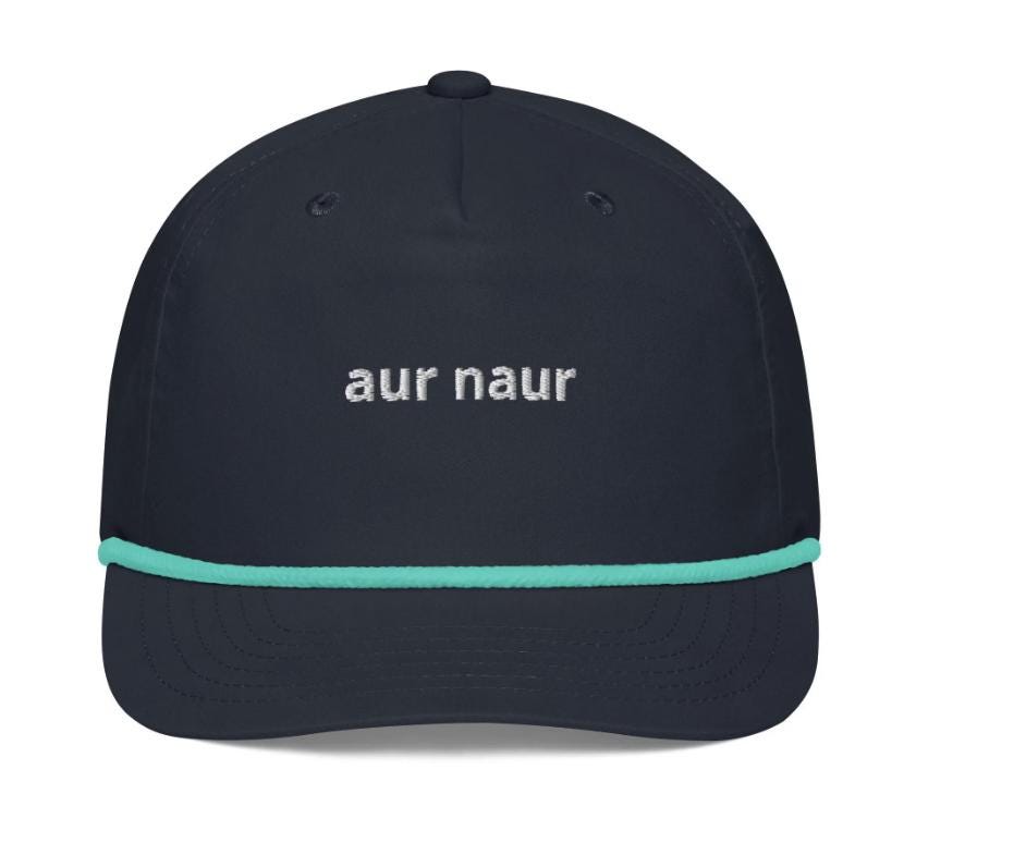 black golf hat with a teal rope near the bill. white text that says &quot;aur naur&quot; (oh no in Australian).